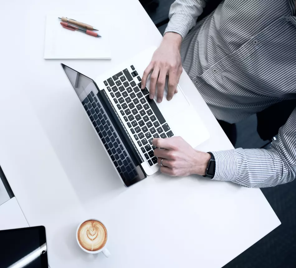 a man working at a laptop